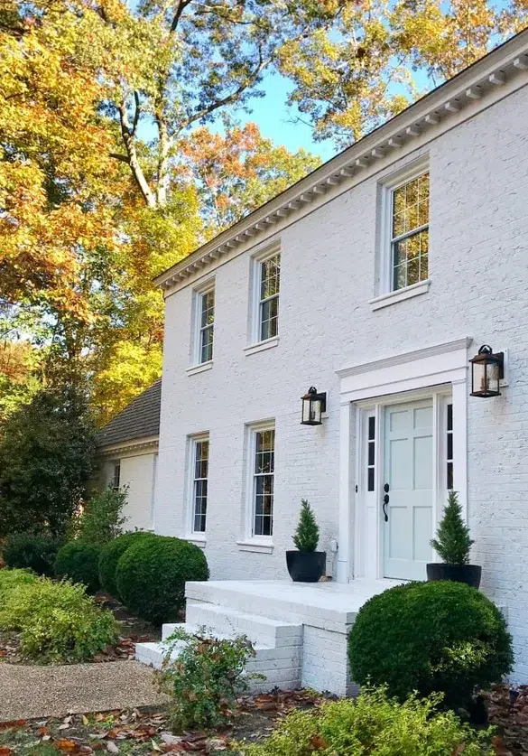 Painters in Farragut TN from Castle Painters finished the painted white brick front of a two-story Farragut home