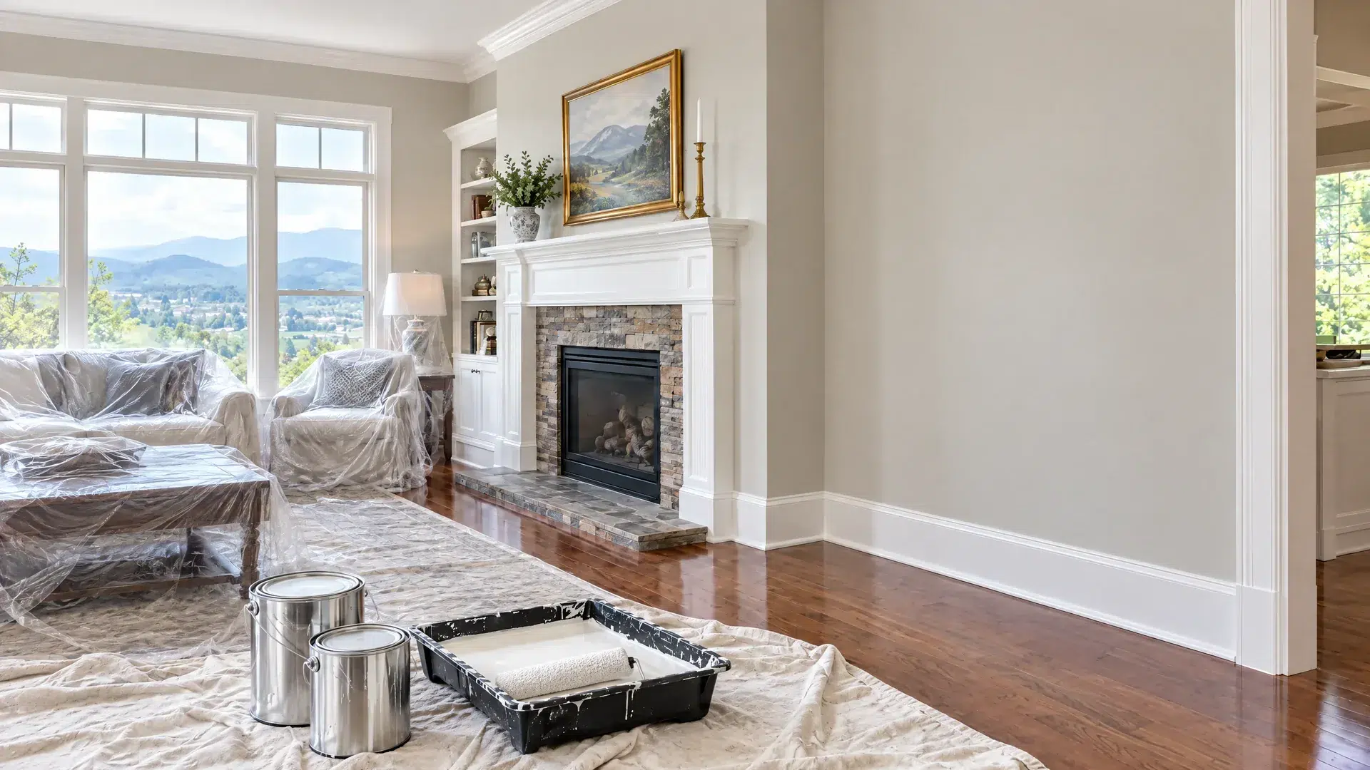 Newly painted living room walls with drop cloths and roller tray, Castle Painters on when you can wash newly painted walls, painting blog in Knoxville, TN